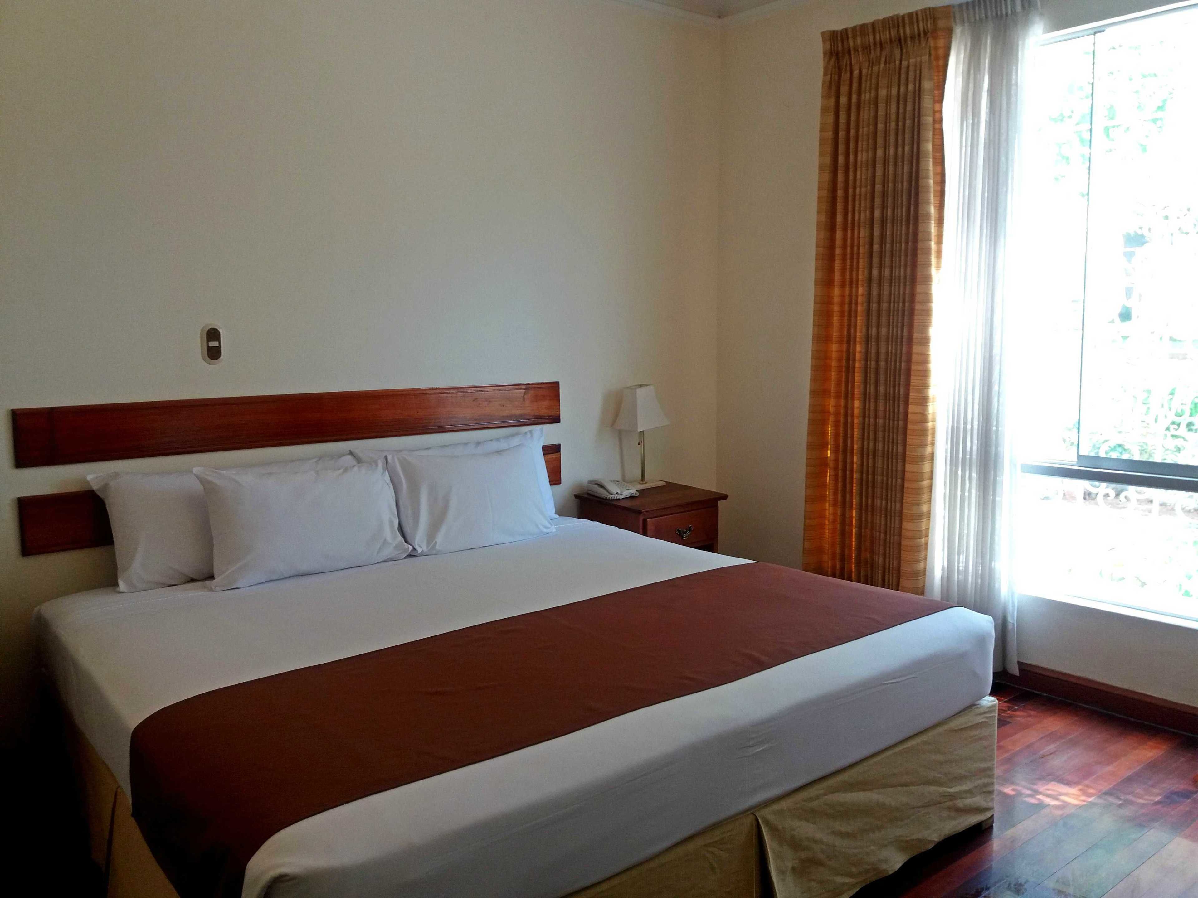 superior suite, 1 king bed | 1 bedroom, down duvets, minibar, desk