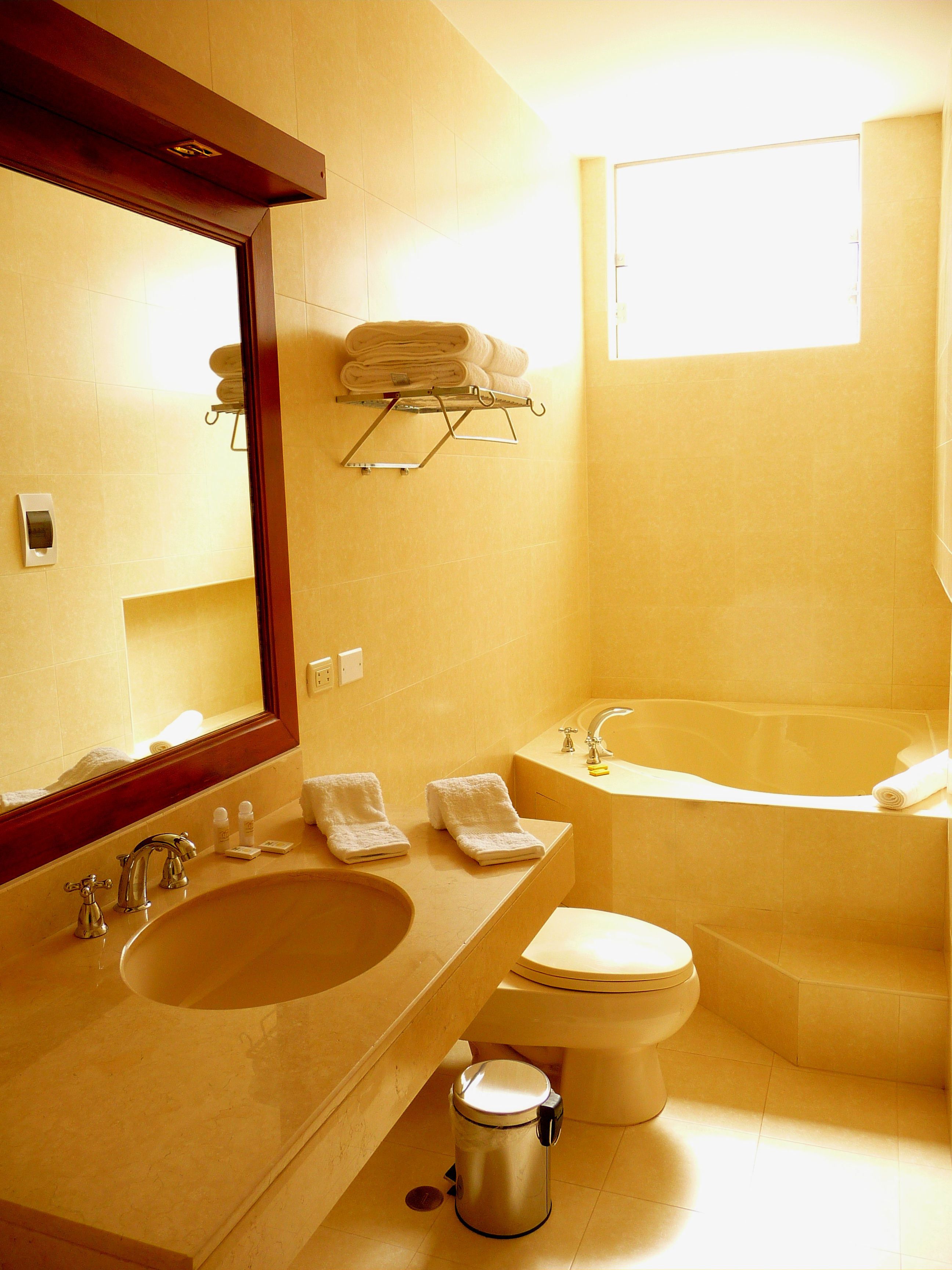 superior suite, 1 king bed | bathroom | combined shower/bathtub, free toiletries, hair dryer, towels