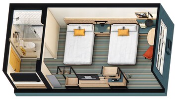 A hotel room with two beds, a desk, a chair, a small table, a sofa, a bathroom, and a window.