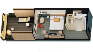 Et moderne hotelværelse med seng, opholdsområde og badeværelse.