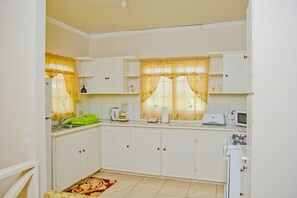 Executive Villa, 5 Bedrooms | 1 bedroom, premium bedding, desk, iron/ironing board - Port of Spain Windy Guest Apartment (Piarco)