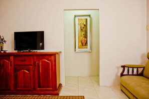 Executive Villa, 5 Bedrooms | 1 bedroom, premium bedding, desk, iron/ironing board - Port of Spain Windy Guest Apartment (Piarco)