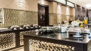 Daily buffet breakfast (USD 23 per person)