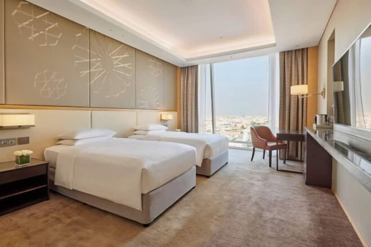 Hypo-allergenic bedding, minibar, in-room safe, desk