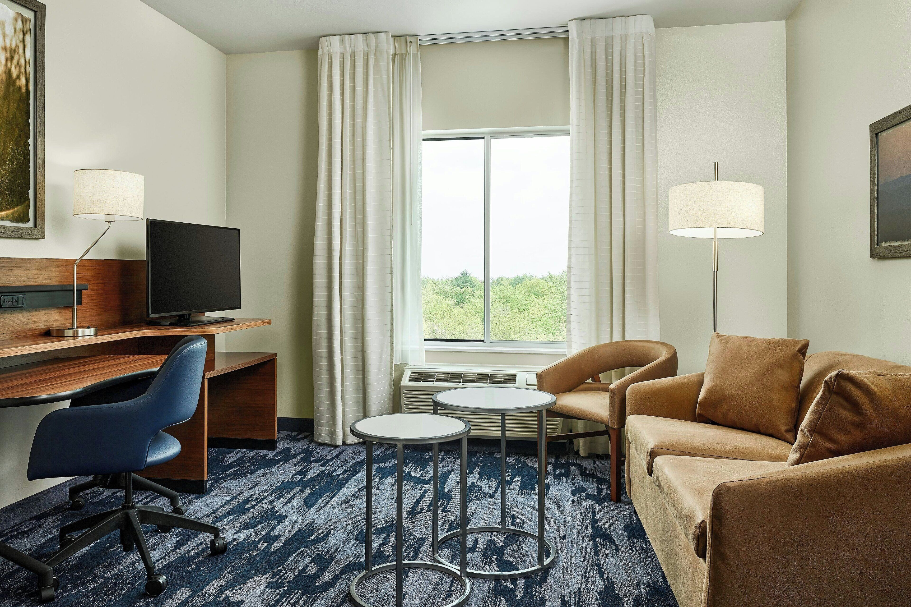 desk, laptop workspace, iron/ironing board, free cots/infant beds