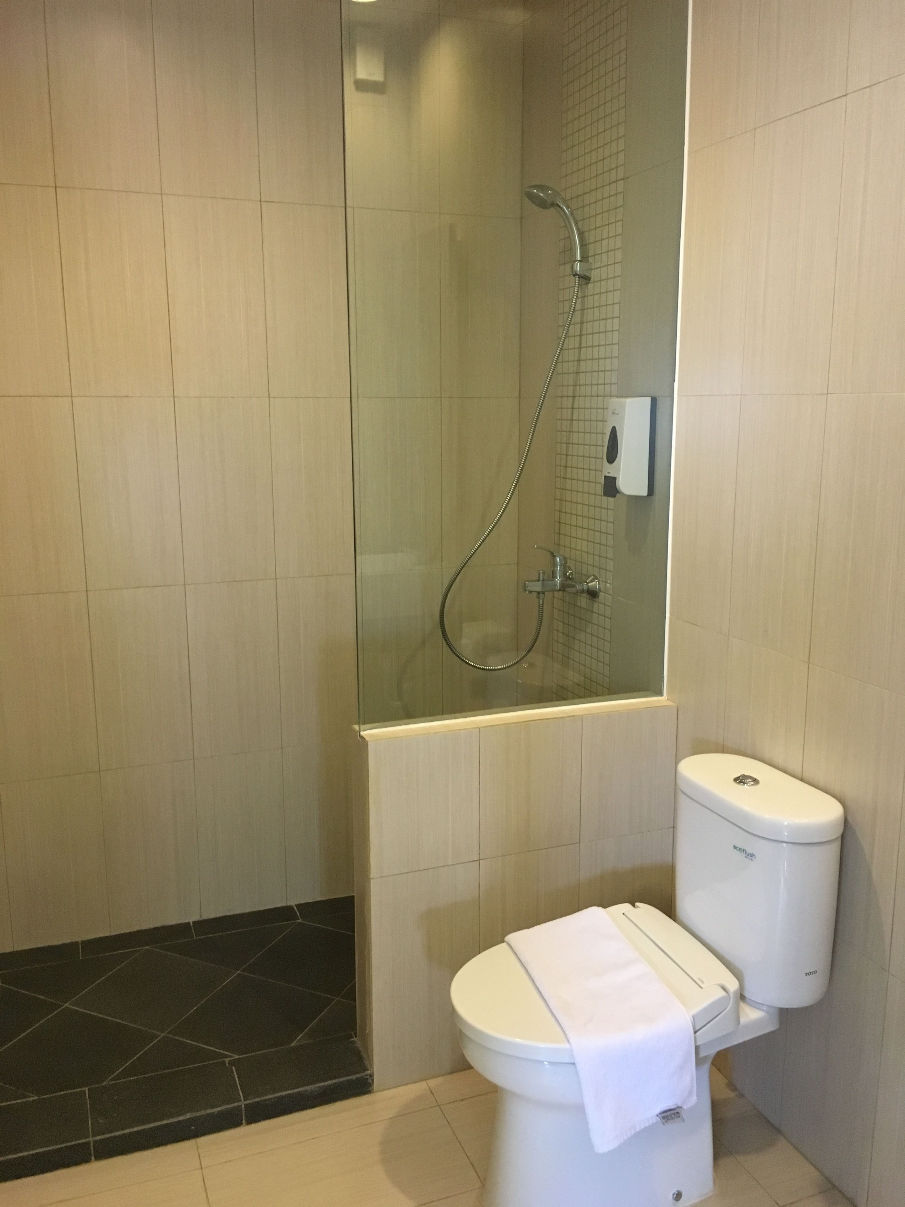 deluxe room, 1 king bed | bathroom | shower, free toiletries, hair dryer, slippers