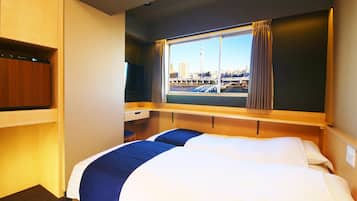 Premium bedding, down duvets, memory-foam beds, in-room safe