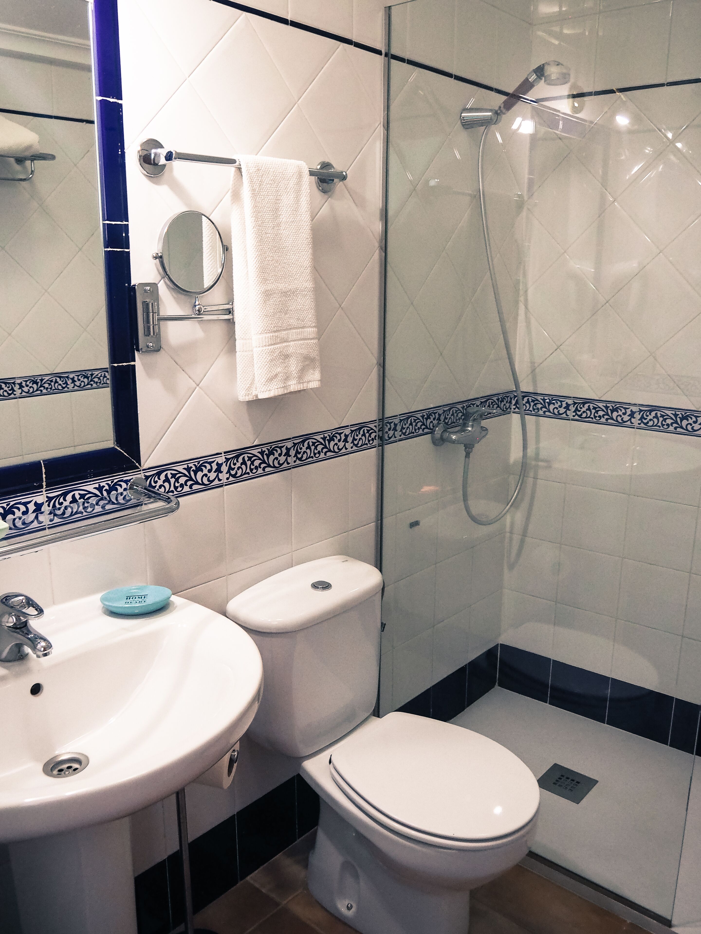 hair dryer, towels, shampoo