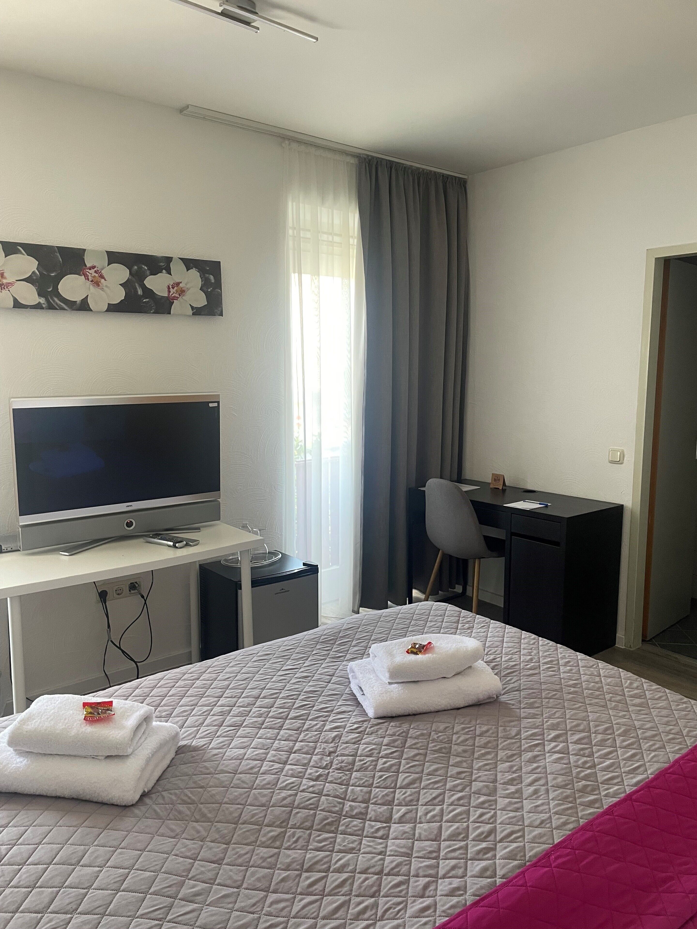 Hypo-allergenic bedding, desk, laptop workspace, free WiFi