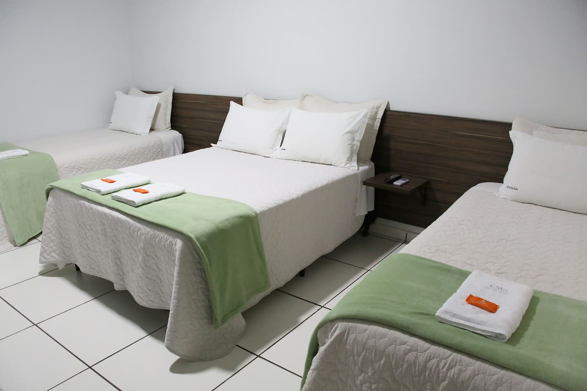 Minibar, desk, bed sheets
