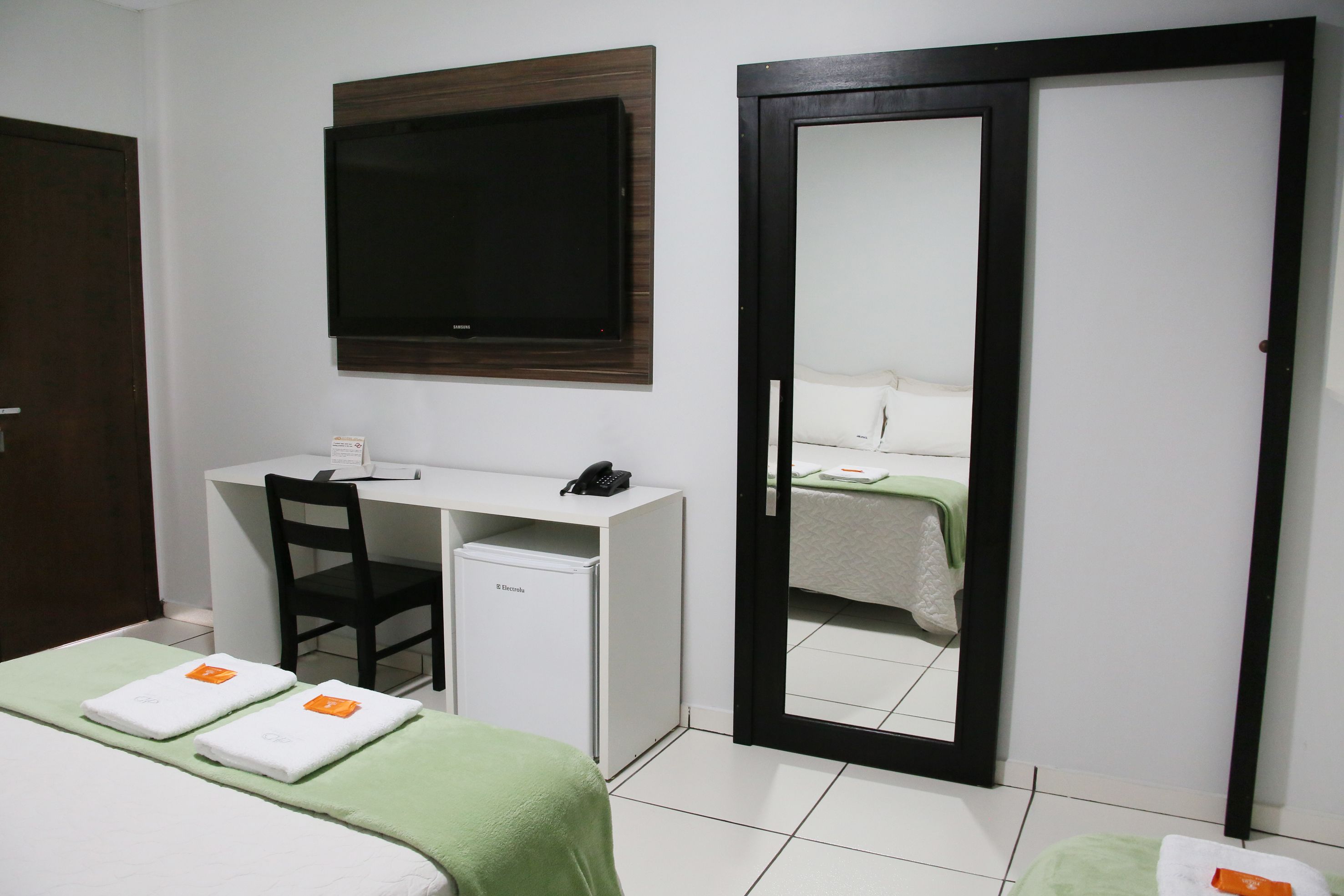 Standard Triple Room | Minibar, desk, bed sheets, wheelchair access