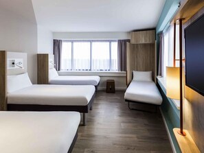 Habitación, 3 camas individuales | Ropa de cama hipoalergénica, insonorización y cunas gratuitas 
