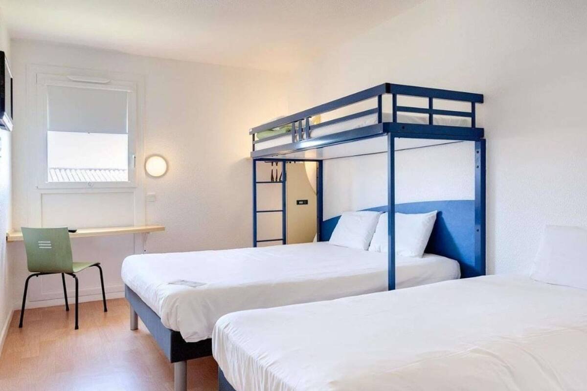 Family Room, 2 Double Beds | Premium bedding, individually decorated, individually furnished, desk