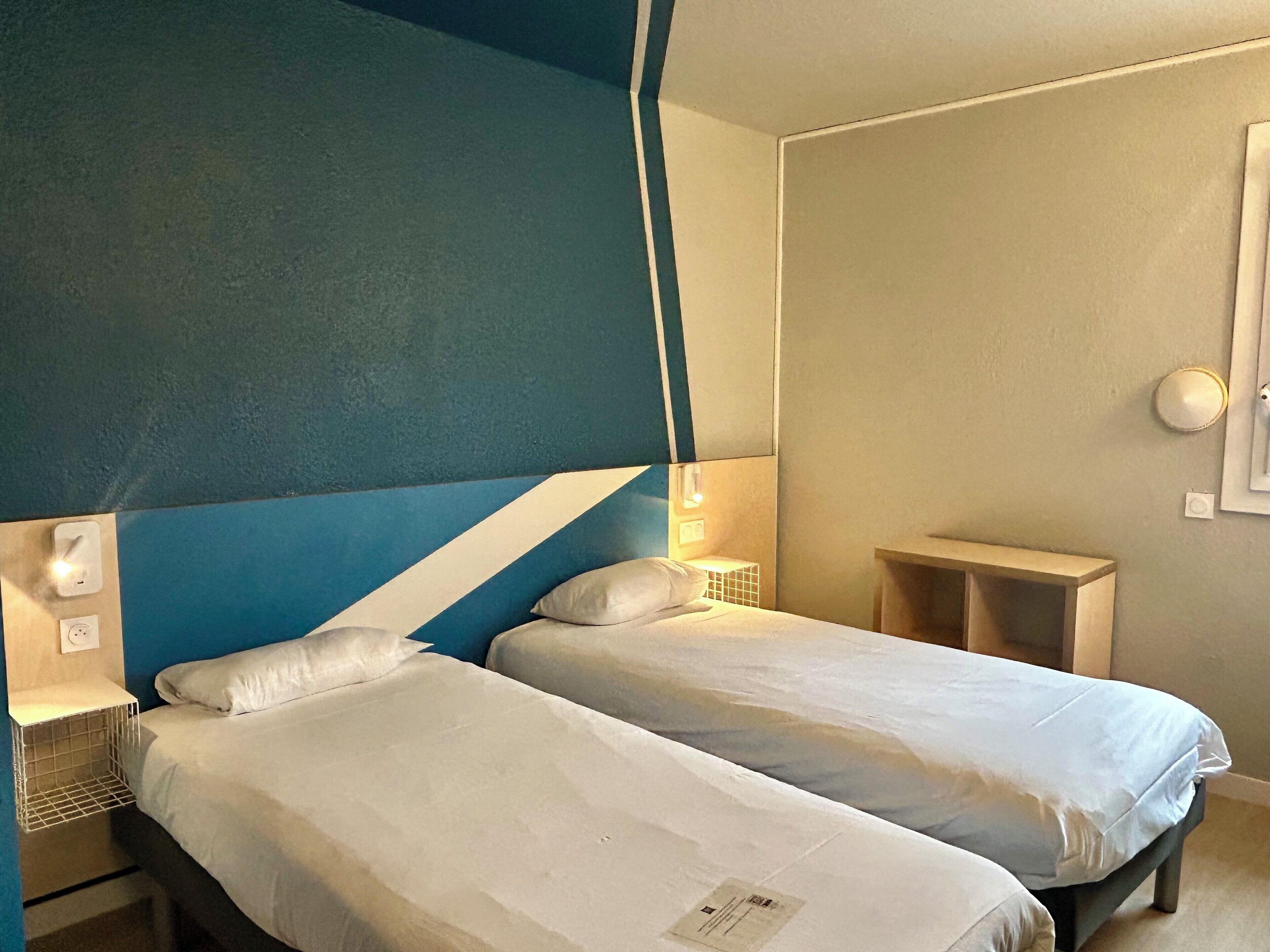Standaard kamer, 2 eenpersoonsbedden | Luxe beddengoed, individueel gedecoreerd, individueel gemeubileerd