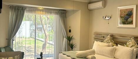 1 غرفة نوم وملاءات من القطن المصري وأغطية فراش متميزة وميني بار