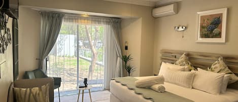 Luxury King Suite | Egyptian cotton sheets, premium bedding, minibar, individually decorated