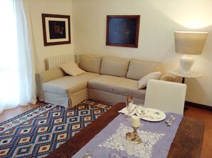 Departamento, 1 habitación | Área de sala de estar