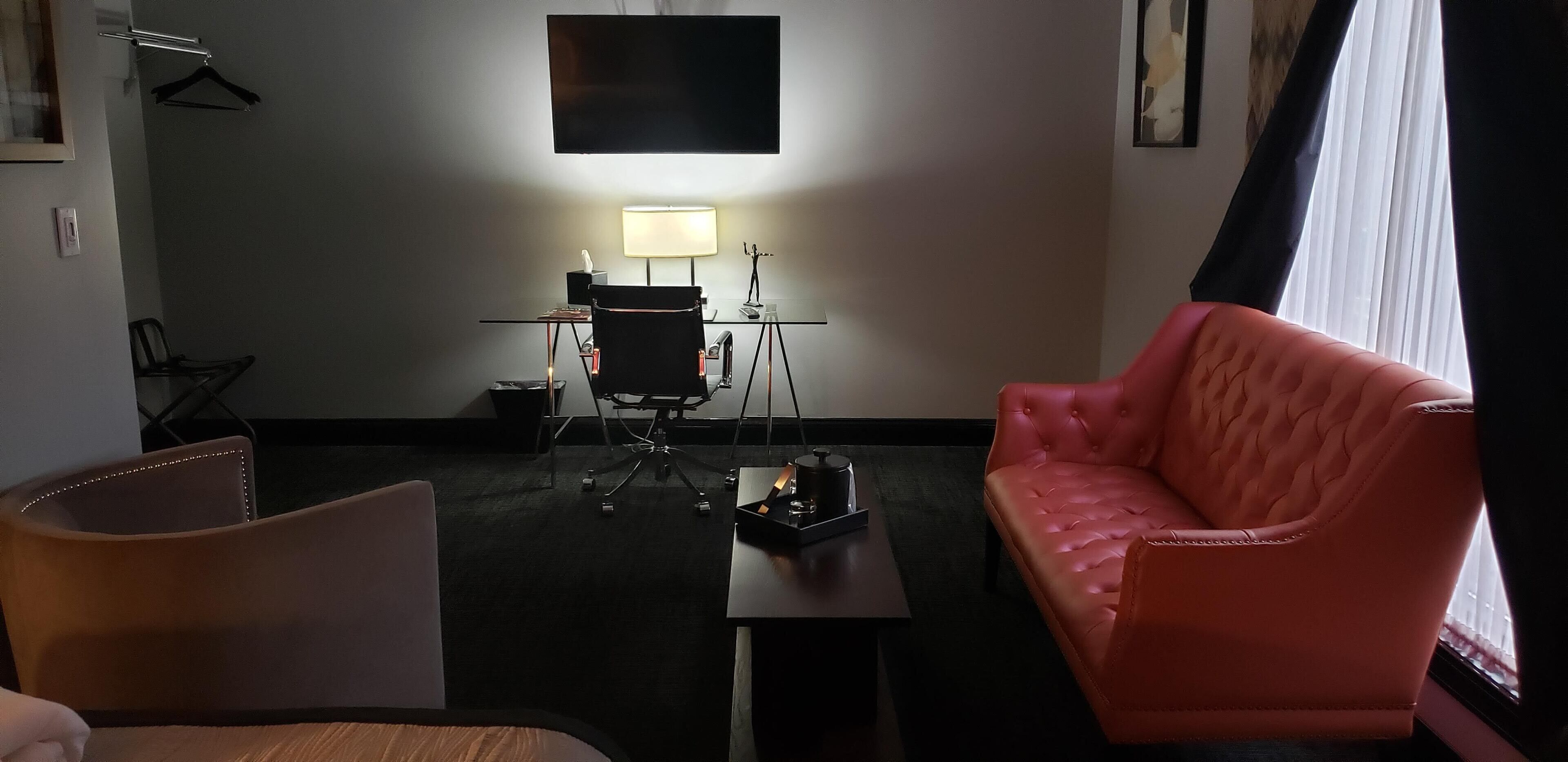 Suite, 1 Queen Bed, Corner (Annex) | Living area | 48-inch flat-screen TV with cable channels, TV