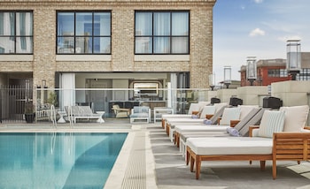 Outdoor pool, cabanas (surcharge), pool umbrellas at Pendry San Diego