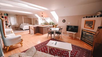Penthouse | Living area | Flat-screen TV