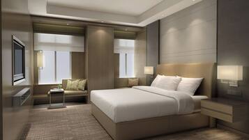 Premium bedding, down duvets, in-room safe, desk