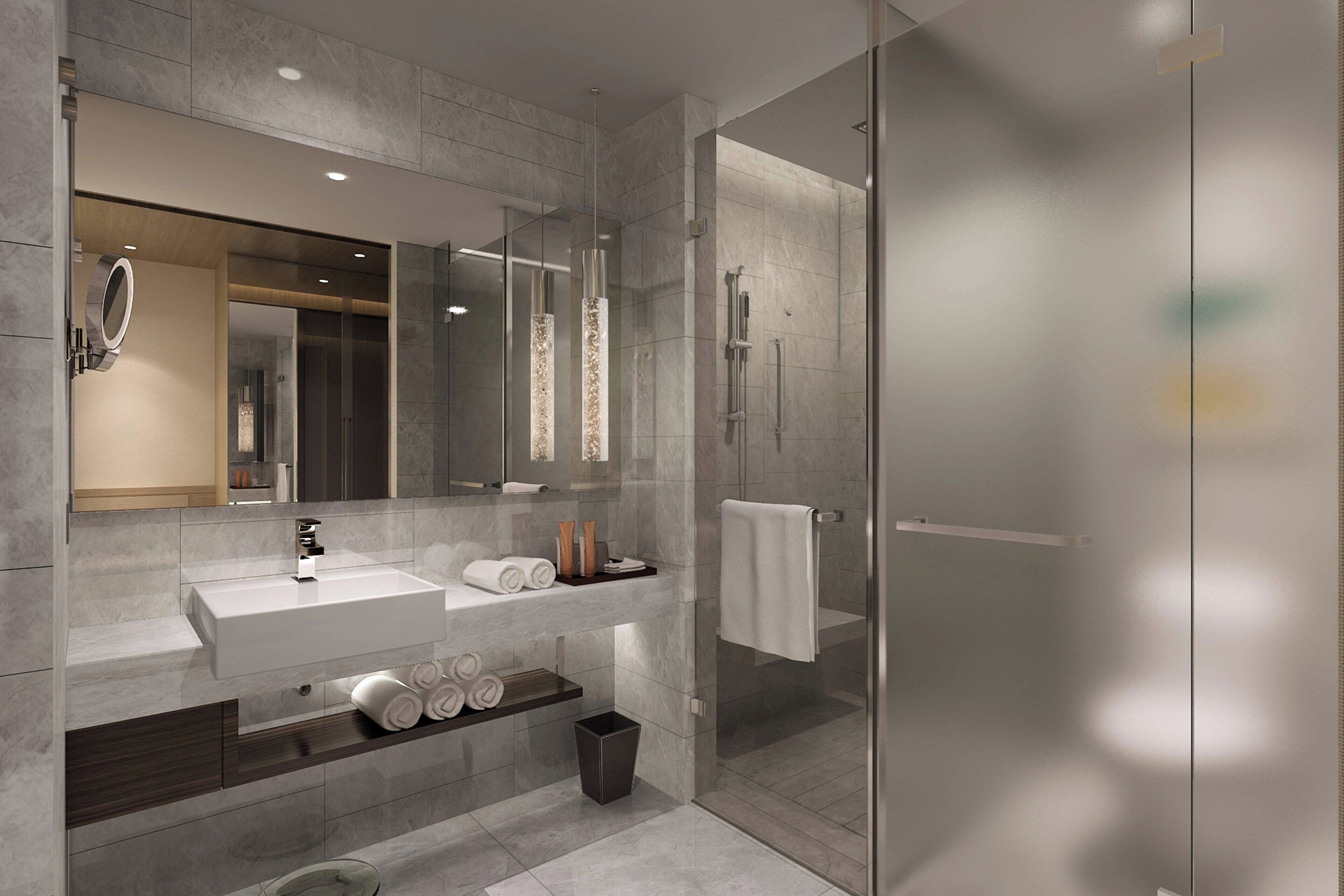 Suite, 1 King Bed, City View | Bathroom | Designer toiletries, hair dryer, bathrobes, slippers