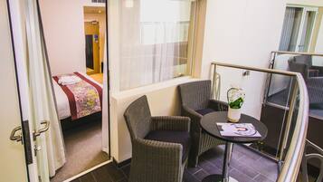 Quarto casal empresarial, sacada | Sacada