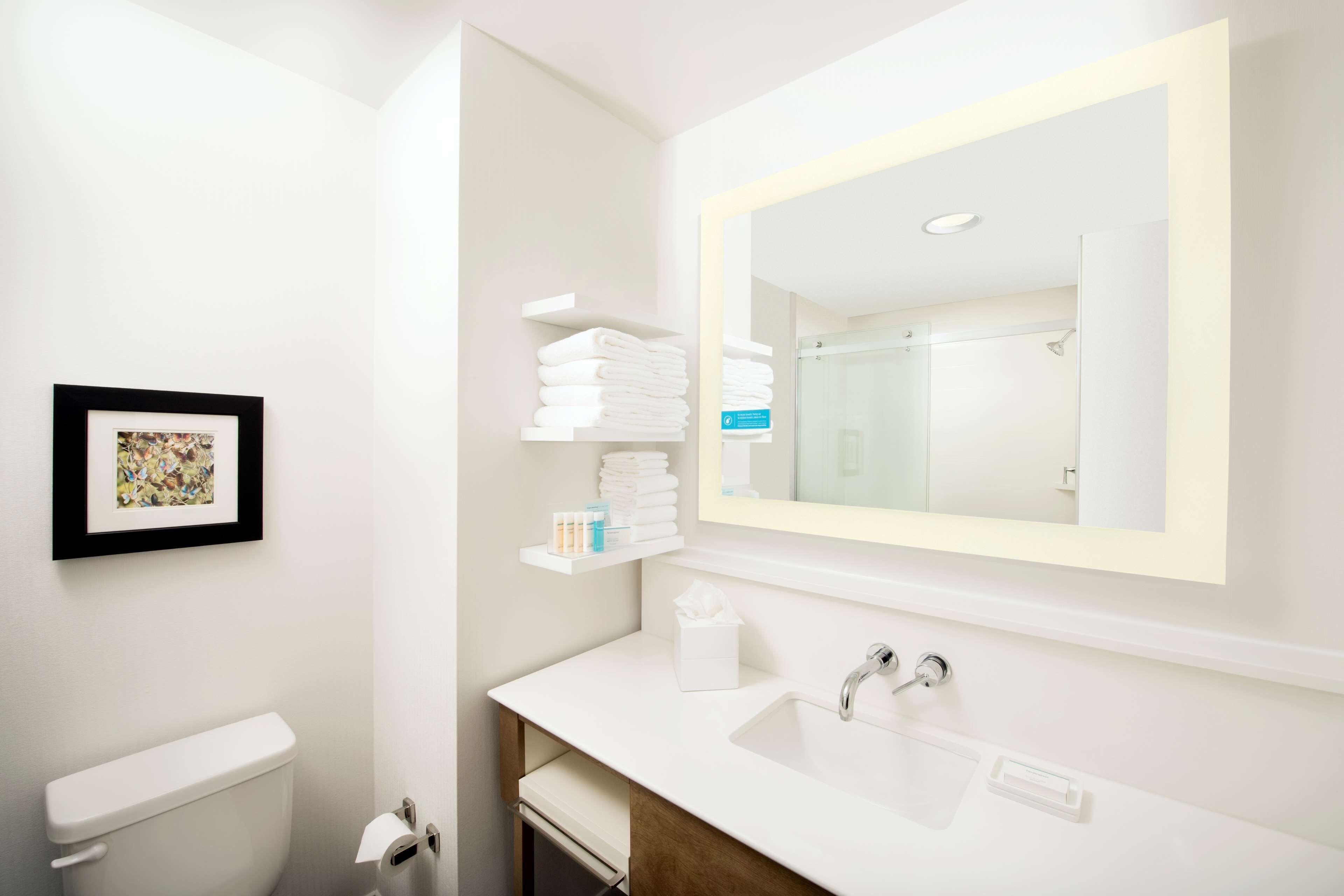 deep-soaking bathtub, rainfall showerhead, free toiletries, hair dryer