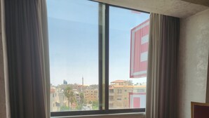Deluxe Twin Room | Spiseområde på rommet