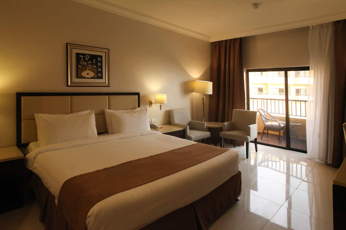 Deluxe Double Room, Pool View, Poolside | 1 bedroom, minibar, in-room safe, iron/ironing board