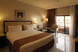 Deluxe Double Room, Pool View, Poolside | 1 bedroom, minibar, in-room safe, iron/ironing board - Grand East Hotel - Resort & Spa Dead Sea (Sweimeh)