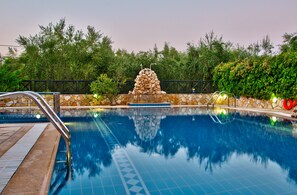 Outdoor pool, pool umbrellas, sun loungers