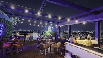 Rooftop bar, pool views, open daily