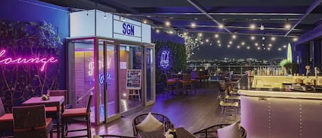 Rooftop bar, pool views, open daily