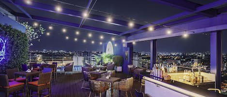 Rooftop bar, pool views, open daily
