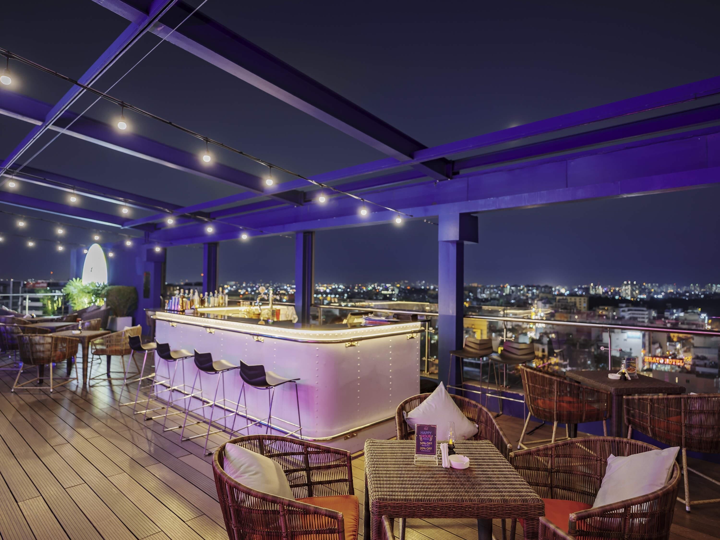 Rooftop bar, pool views, open daily