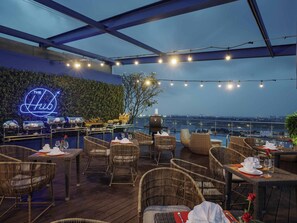 Rooftop bar, poolside views, open daily