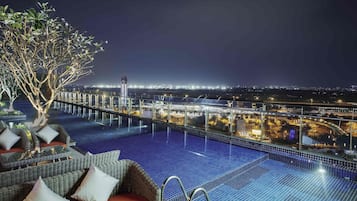 Outdoor pool, open 6:00 AM to 10:00 PM, pool umbrellas, sun loungers