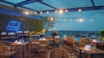 Rooftop bar, poolside views, open daily