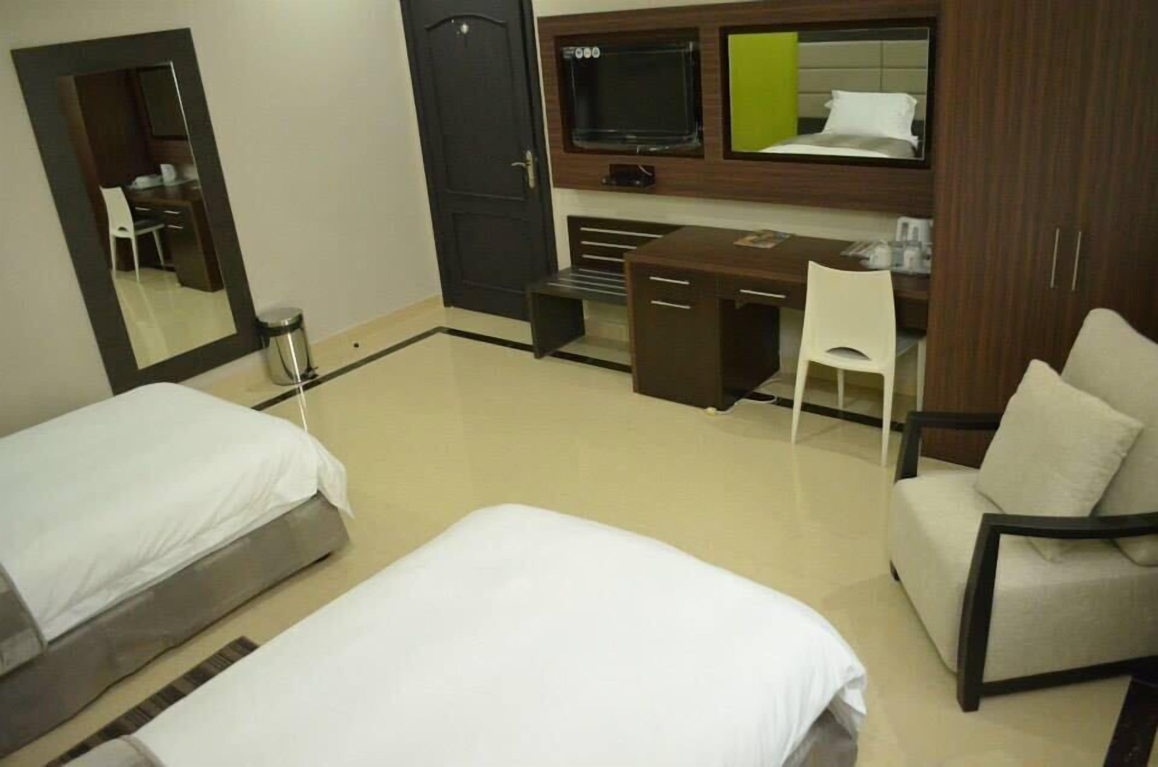 twin room | living area | lcd tv