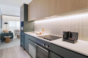 Microwave, stovetop, coffee/tea maker, electric kettle