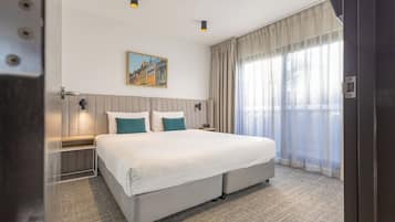 Premium bedding, pillow-top beds, in-room safe, desk