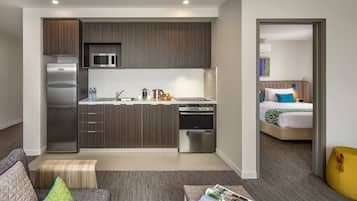 Fridge, microwave, stovetop, coffee/tea maker