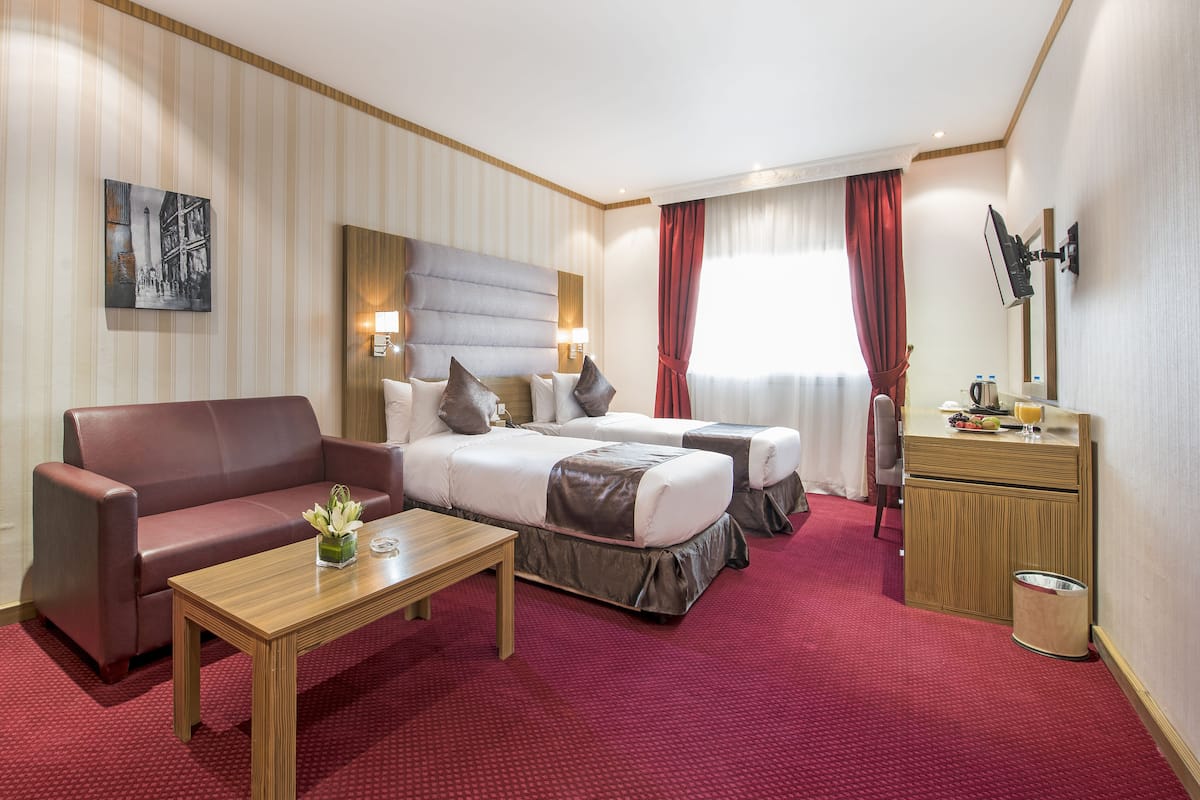 Deluxe Room | Premium bedding, minibar, in-room safe, iron/ironing board