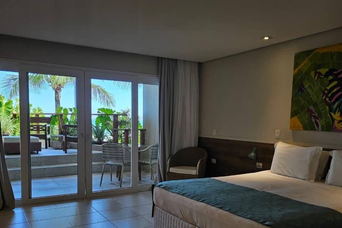 Chambre exclusive, patio, vue sur la mer | Minibar, coffre-fort, systĂšme dâinsonorisation, literie fournie