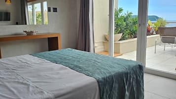 Elite Room, Patio, Sea View | Minibar, in-room safe, soundproofing, bed sheets