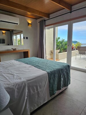 Elite Room, Patio, Sea View | Minibar, in-room safe, soundproofing, bed sheets
