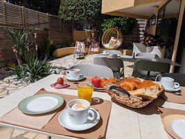 Daily buffet breakfast (EUR 14 per person)