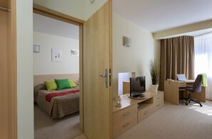 Apartment, 1 Bedroom | Desk, laptop workspace, soundproofing, iron/ironing board - Media Park (Warsaw)