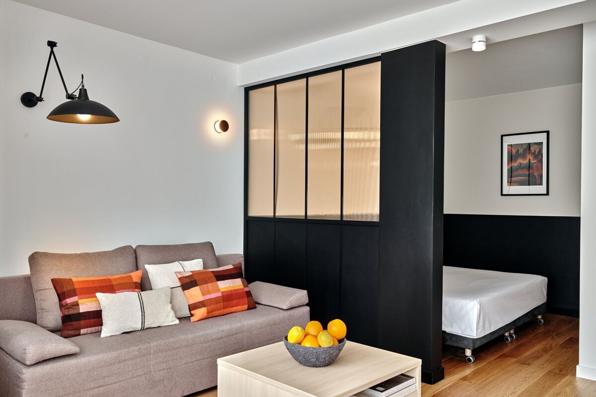 Deluxe Studio | Desk, laptop workspace, soundproofing, iron/ironing board
